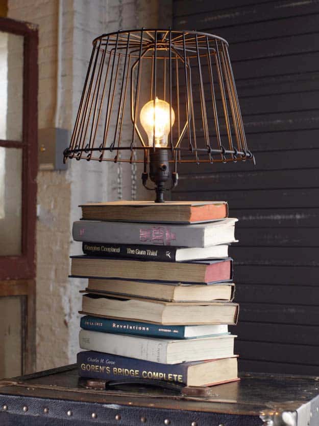 DIY Lighting Ideas and Cool DIY Light Projects for the Home. Chandeliers, lamps, awesome pendants and creative hanging fixtures,  complete with tutorials with instructions | Stacked Books Table Lamp | http://diyjoy.com/diy-projects-lighting-ideas