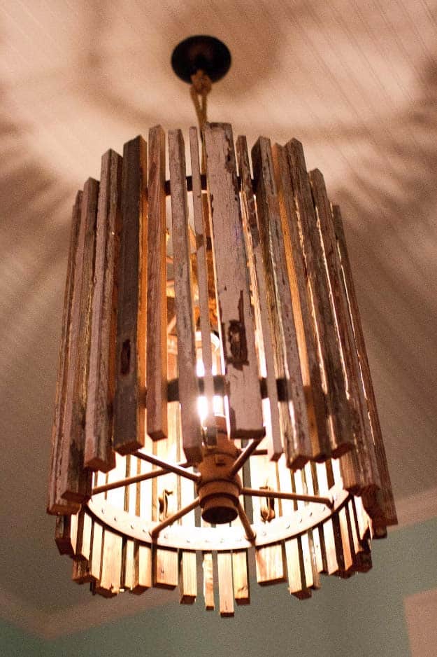 DIY Lighting Ideas and Cool DIY Light Projects for the Home. Chandeliers, lamps, awesome pendants and creative hanging fixtures,  complete with tutorials with instructions | Upcycled Old Wood DIY Pendant Light | http://diyjoy.com/diy-projects-lighting-ideas