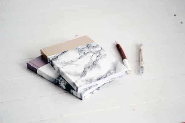 27 MORE Expensive Looking DIY Gifts. Crafts and DIY Gift Ideas for Him, for Her, for Family and Friends. Perfect for Birthday, Christmas, Mom and Dad. | DIY Marbled Notebook | http://diyjoy.com/homemade-diy-gifts-pinterest