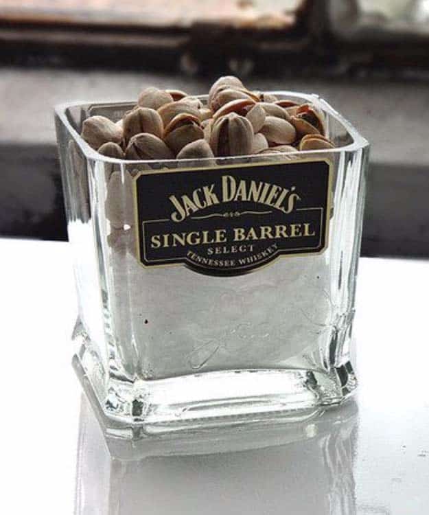 Fun DIY Ideas Made With Jack Daniels - Recipes, Projects and Crafts With The Bottle, Everything From Lamps and Decorations to Fudge and Cupcakes | Jack Daniels Single Barrel Nuts or Candy Dish Cut Bottle Idea #diy #jackdaniels #recipes #crafts