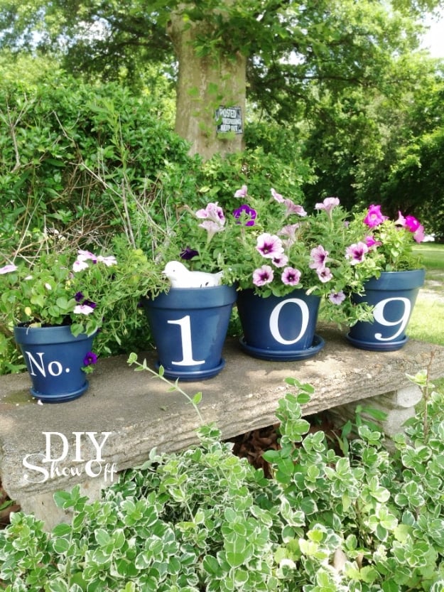 Creative Ways to Increase Curb Appeal on A Budget - House Number Flower Pots - Cheap and Easy Ideas for Upgrading Your Front Porch, Landscaping, Driveways, Garage Doors, Brick and Home Exteriors. Add Window Boxes, House Numbers, Mailboxes and Yard Makeovers http://diyjoy.com/diy-curb-appeal-ideas