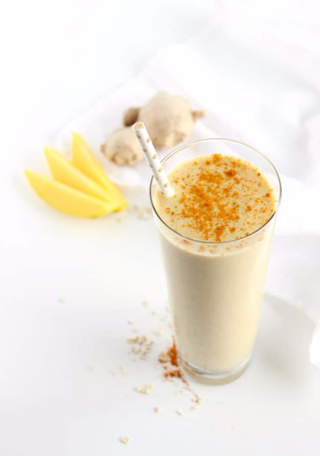 Healthy Smoothie Recipes - Mango Ginger Turmeric Smoothie - Easy ideas perfect for breakfast, energy. Low calorie and high protein recipes for weightloss and to lose weight. Simple homemade recipe ideas that kids love. Quick EASY morning recipes before work and school, after workout #smoothies #healthy #smoothie #healthyrecipes #recipes