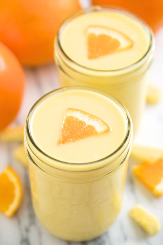 Healthy Smoothie Recipes - Pineapple Orange Banana Smoothie - Easy ideas perfect for breakfast, energy. Low calorie and high protein recipes for weightloss and to lose weight. Simple homemade recipe ideas that kids love. Quick EASY morning recipes before work and school, after workout #smoothies #healthy #smoothie #healthyrecipes #recipes