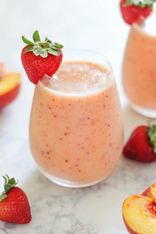 Healthy Smoothie Recipes - Strawberry Peach Smoothie - Easy ideas perfect for breakfast, energy. Low calorie and high protein recipes for weightloss and to lose weight. Simple homemade recipe ideas that kids love. Quick EASY morning recipes before work and school, after workout #smoothies #healthy #smoothie #healthyrecipes #recipes