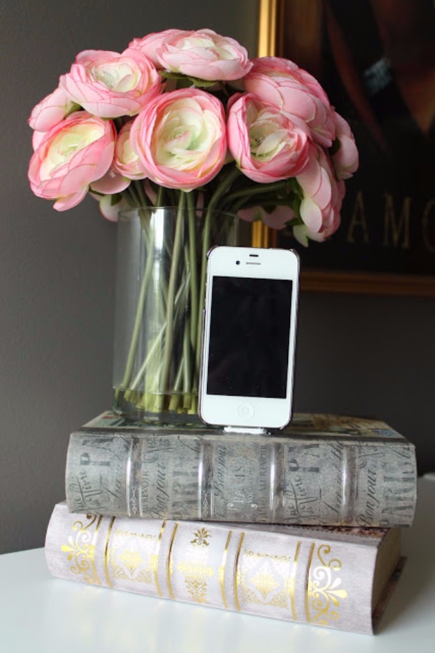DIY Phone Hacks - Iphone Dock From Old Books - Cool Tips and Tricks for Phones, Headphones and iPhone How To - Make Speakers, Change Settings, Know Secrets You Can Do With Your Phone By Learning This Cool Stuff - DIY Projects and Crafts for Men and Women http://diyjoy.com/diy-iphone-hacks