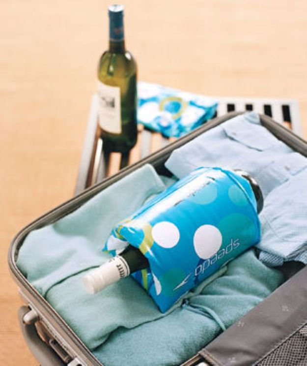 Packing Tips for Travel - Floaties as Wine Bottle Protectors - Easy Ideas for Packing a Suitcase To Maximize Space - Tricks and Hacks for Folding Clothes, Storing Toiletries, Shampoo and Makeup - Keep Clothing Wrinkle Free in Your Bag http://diyjoy.com/packing-tips-travel
