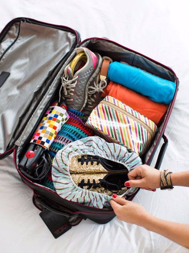 Packing Tips for Travel - Put A Shower Cap On Your Shoes - Easy Ideas for Packing a Suitcase To Maximize Space - Tricks and Hacks for Folding Clothes, Storing Toiletries, Shampoo and Makeup - Keep Clothing Wrinkle Free in Your Bag http://diyjoy.com/packing-tips-travel