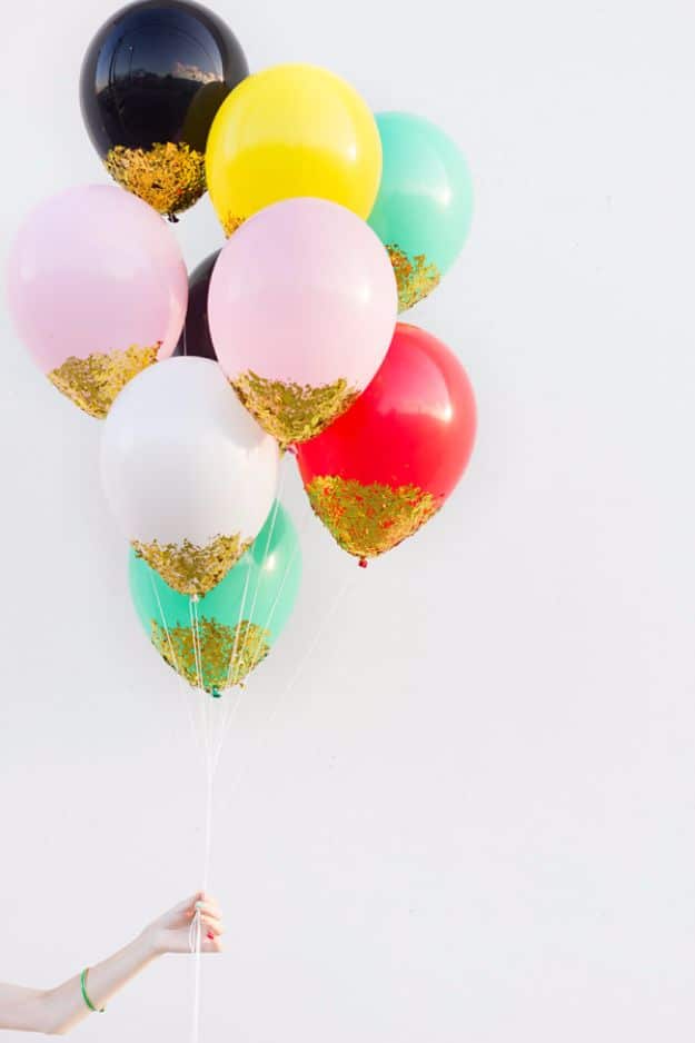 New Years Eve Decor Ideas - DIY Confetti Dipped Balloons - DIY New Year's Eve Decorations - Cheap Ideas for Banners, Balloons, Party Tables, Centerpieces and Festive Streamers and Lights - Cool Placecards, Photo Backdrops, Party Hats, Party Horns and Champagne Glasses - Cute Invitations, Games and Free Printables #diy #newyearseve #parties