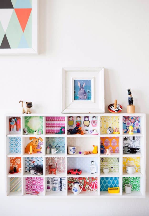DIY Ideas for Wallpaper Scraps - Wallpaper Backed Bookcase - Cute Projects and Easy DIY Gift Ideas to Make With Leftover Wall Paper - Fun Home Decor, Homemade Wall Art Idea Tutorials, Creative Ways to Use Old Wallpapers - Cool Crafts for Men, Women and Teens http://diyjoy.com/diy-ideas-wallpaper-scraps
