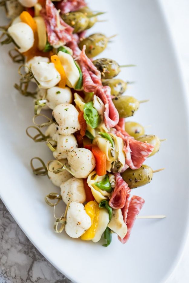 Best Dinner Party Ideas - Antipasto Skewers - Best Recipes for Foods to Serve, Casseroles, Finger Foods, Desserts and Appetizers- Place Settings and Cards, Centerpieces, Table Decor and Recipe Ideas for Supper Clubs and Dinner Parties http://diyjoy.com/best-dinner-party-ideas