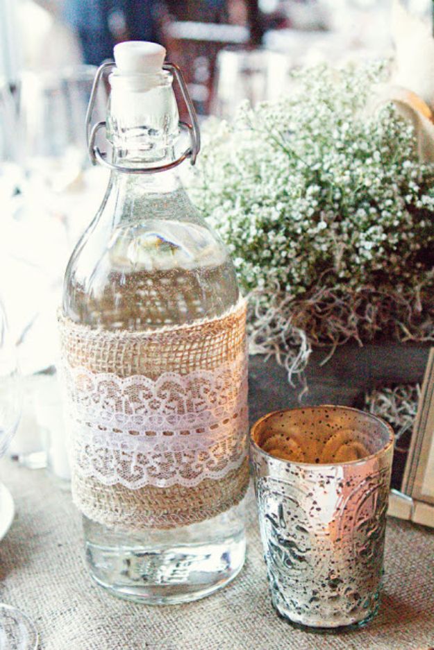 DIY Burlap Ideas - Burlap And Lace Bottle - Burlap Furniture, Home Decor and Crafts - Banners and Buntings, Wall Art, Ottoman from Coffee Sacks, Wreath, Centerpieces and Table Runner - Kitchen, Bedroom, Living Room, Bathroom Ideas - Shabby Chic Craft Projects and DIY Wedding Decor http://diyjoy.com/diy-burlap-decor-ideas