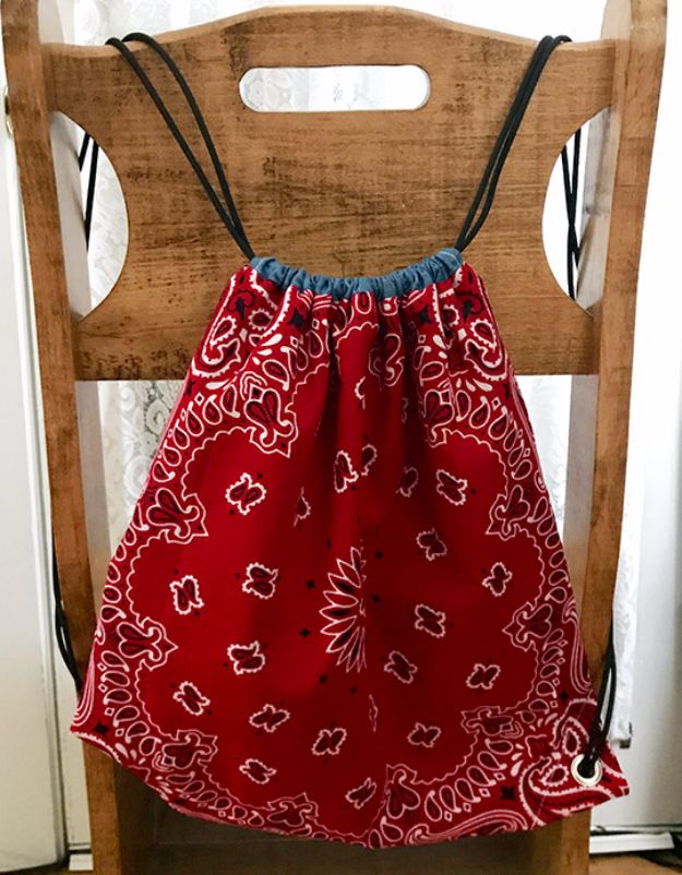 DIY Ideas With Bandanas - DIY Drawstring Bandana Backpack - Bandana Crafts and Decor Projects Made With A Bandana - No Sew Ideas, Bags, Bracelets, Hats, Halter Tops, Blankets and Quilts, Headbands, Simple Craft Project Tutorials for Kids and Teens - Home Decoration and Country Themed Crafts To Make and Sell On Etsy #crafts #country #diy