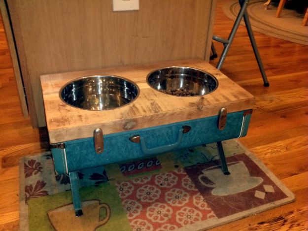 DIY Pet Bowls And Feeding Stations - Raised Dog Bowls From Vintage Suitcase - Easy Ideas for Serving Dog and Cat Food, Ways to Raise and Store Bowls - Organize Your Dog Food and Water Bowl With These Cute and Creative Ideas for Dogs and Cats- Monogram, Painted, Personalized and Rustic Crafts and Projects http://diyjoy.com/diy-pet-bowls-feeding-station