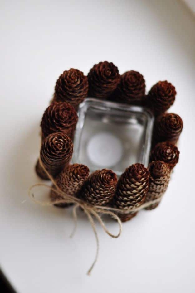 DIY Candle Holders - Simple DIY Pine Cone Candle Holder - Easy Ideas for Home Decor With Candles, Tall Candlesticks and Votives - Fun Wooden, Rustic, Glass, Mason Jar, Boho and Projects With Items From Dollar Stores - Christmas, Holiday and Wedding Centerpieces - Cool Crafts and Homemade Cheap Gifts http://diyjoy.com/diy-candle-holders