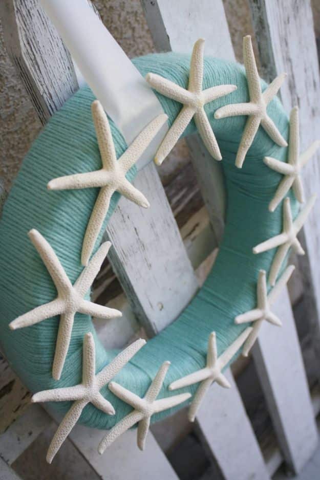 DIY Beach House Decor - Starfish Yarn Wreath - Cool DIY Decor Ideas While On A Budget - Cool Ideas for Decorating Your Beach Home With Shells, Sand and Summer Wall Art - Crafts and Do It Yourself Projects With A Breezy, Blue, Summery Feel - White Decor and Shiplap, Birchwood Boats, Beachy Sea Glass Art Projects for Living Room, Bedroom and Kitchen 