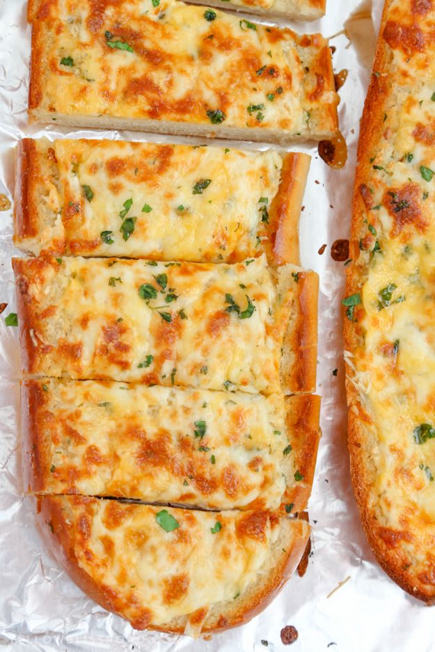 Best Recipes for the Cheese Lover - Cheesy Garlic Bread - Easy Recipe Ideas With Cheese - Homemade Appetizers, Dips, Dinners, Snacks, Pasta Dishes, Healthy Lunches and Soups Made With Your Favorite Cheeses - Ricotta, Cheddar, Swiss, Parmesan, Goat Chevre, Mozzarella and Feta Ideas - Grilled, Healthy, Vegan and Vegetarian #cheeserecipes #recipes #recipeideas #cheese #cheeserecipe 