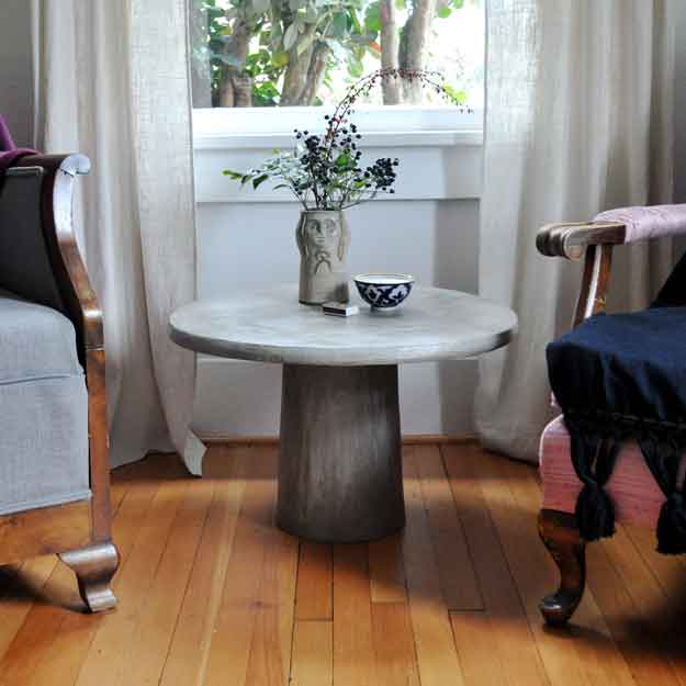 DIY Coffee Tables - DIY Concrete Pedestal Coffee Table - Easy Do It Yourself Furniture Ideas for The Living Room Table - Cool Projects for Making a Coffee Table With Crates, Boxes, Stone, Industrial Pipe, Tile, Pallets, Old Doors, Windows and Repurposed Wood Planks - Rustic Farmhouse Home Decor, Modern Decorating Ideas, Simply Shabby Chic and All White Looks for Minimalist Interiors http://diyjoy.com/diy-coffee-table-ideas