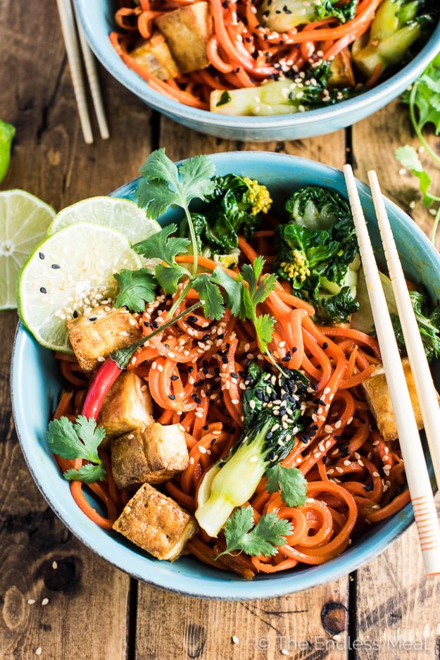 Veggie Noodle Recipes - Sesame Ginger Carrot Noodle Stir Fry with Bok Choy and Crispy Tofu - How to Cook With Veggie Noodles - Healthy Pasta Recipe Ideas - How to Make Veggie Noodles With Carrots and Zucchini - Vegan, Vegetarian , Keto and Low Carb Dishes for Your Diet - Meatballs, Chicken, Cheese, Asian Stir Fry, Salad and Raw Preparations #veggienoodles #recipes #keto #lowcarb #ketorecipes #veggies #healthyrecipes #veganrecipes 