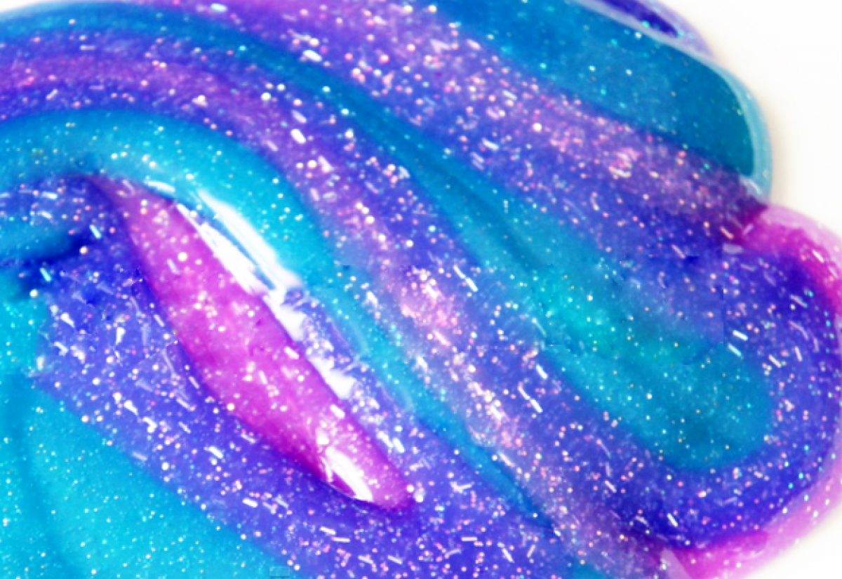 I made DIY Galaxy slime out of Sta-Flo liquid starch, clear Elmers