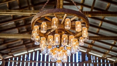 DIY Mason Jar Crafts for the Home - DIY Chandelier from Upcycled Wagon Wheel & Mason Jars - DIY Projects & Crafts by DIY JOY at
