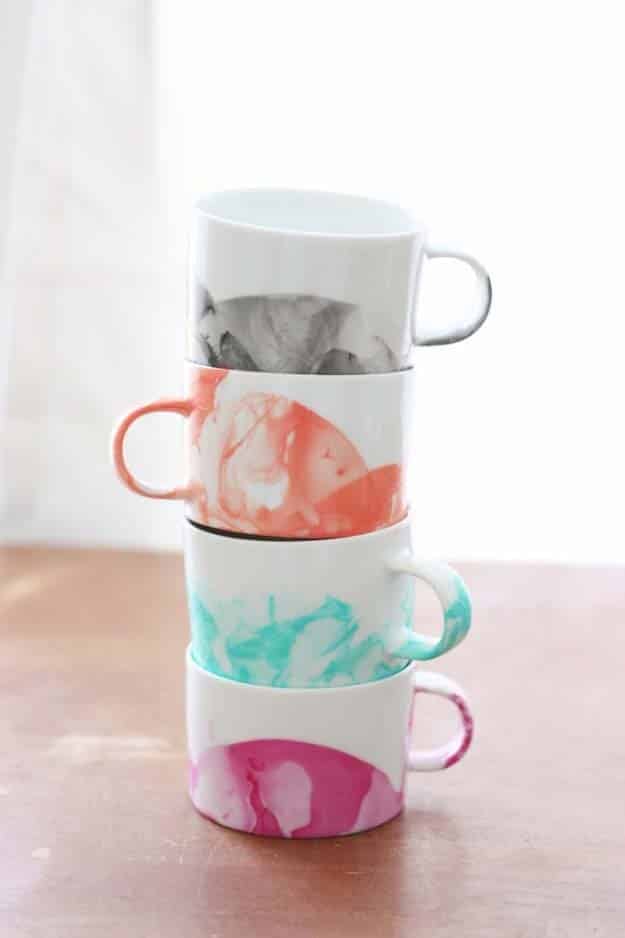 76 Crafts To Make and Sell - Easy DIY Ideas for Cheap Things To Sell on Etsy, Online and for Craft Fairs. Make Money with These Homemade Crafts for Teens, Kids, Christmas, Summer, Mother’s Day Gifts. | DIY Marbled Mugs with Nail Polish #crafts #diy