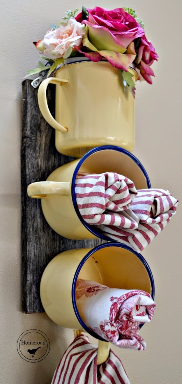 Rustic enamel coffee cup with word coffee on it and decorative