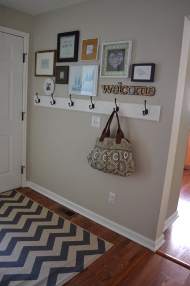 DIY Ideas for Your Entry - Frame Gallery In The Entryway - Cool and Creative Home Decor or Entryway and Hall. Modern, Rustic and Classic Decor on a Budget. Impress House Guests and Fall in Love With These DIY Furniture and Wall Art Ideas #diydecor #diyhomedecor