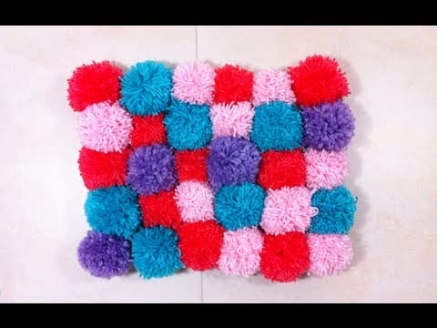 Easy DIY Rugs and Handmade Rug Making Project Ideas - Cozy, Soft & Plush Pom Pom Rug is so Easy to Make! - Simple Home Decor for Your Floors, Fabric, Area, Painting Ideas, Rag Rugs, No Sew, Dropcloth and Braided Rug Tutorials http://diyjoy.com/diy-rugs-ideas