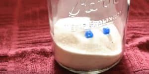 She Puts A Rock In A Mason Jar And Adds Two Drops Of Food Coloring. Watch What Happens Next