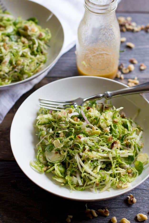 Best Brussel Sprout Recipes - Shaved Brussels Sprout Salad With Apples And Walnuts - Easy and Quick Delicious Ideas for Making Brussel Sprouts With Bacon, Roasted, Creamy, Healthy, Baked, Sauteed, Crockpot, Grilled, Shredded and Salad Recipe Ideas #recipes