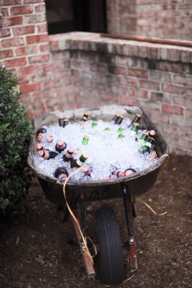 DIY Outdoors Wedding Ideas - Wheelbarrow Cooler - Step by Step Tutorials and Projects Ideas for Summer Brides - Lighting, Mason Jar Centerpieces, Table Decor, Party Favors, Guestbook Ideas, Signs, Flowers, Banners, Tablecloth #wedding #diy