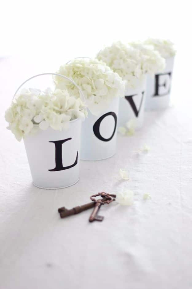 DIY Wedding Centerpieces - LOVE Tin Pail Flower Arrangement - Do It Yourself Ideas for Brides and Best Centerpiece Ideas for Weddings - Step by Step Tutorials for Making Mason Jars, Rustic Crafts, Flowers, Modern Decor, Vintage and Cheap Ideas for Couples on A Budget Outdoor and Indoor Weddings #diyweddings #weddingcenterpieces #weddingdecorideas