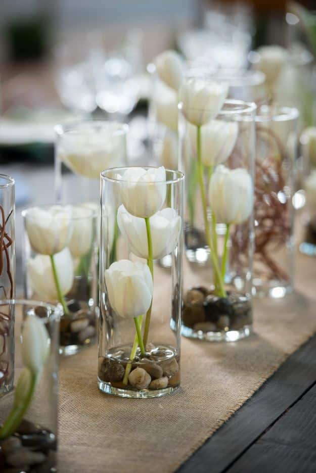 DIY Wedding Centerpieces - Tulips In Glass Vases - Do It Yourself Ideas for Brides and Best Centerpiece Ideas for Weddings - Step by Step Tutorials for Making Mason Jars, Rustic Crafts, Flowers, Modern Decor, Vintage and Cheap Ideas for Couples on A Budget Outdoor and Indoor Weddings #diyweddings #weddingcenterpieces #weddingdecorideas