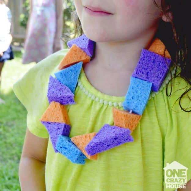 DIY Hacks for Summer - Summer Sponge Lei - Easy Projects to Try This Summer To Get Organized, Spend Time Outdoors, Play With The Kids, Stay Cool In The Heat - Tips and Tricks to Make Summertime Awesome - Crafts and Home Decor by DIY JOY