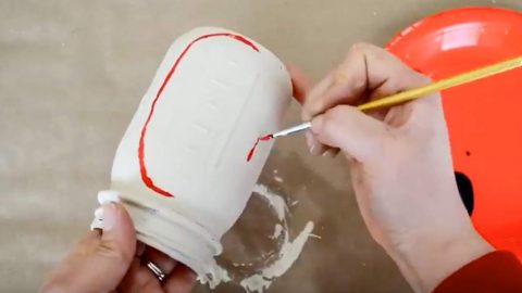 She Paints A Mason Jar White And Next She Paints An All Time Favorite Design In Red! | DIY Joy Projects and Crafts Ideas