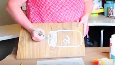 She Paints A Mason Jar On Wood But It’s What She Does Next That Will Leave You Wanting One! | DIY Joy Projects and Crafts Ideas