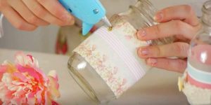 She Puts Scrapbook Paper On A Mason Jar, Then What She Adds Is The Icing On The Cake!