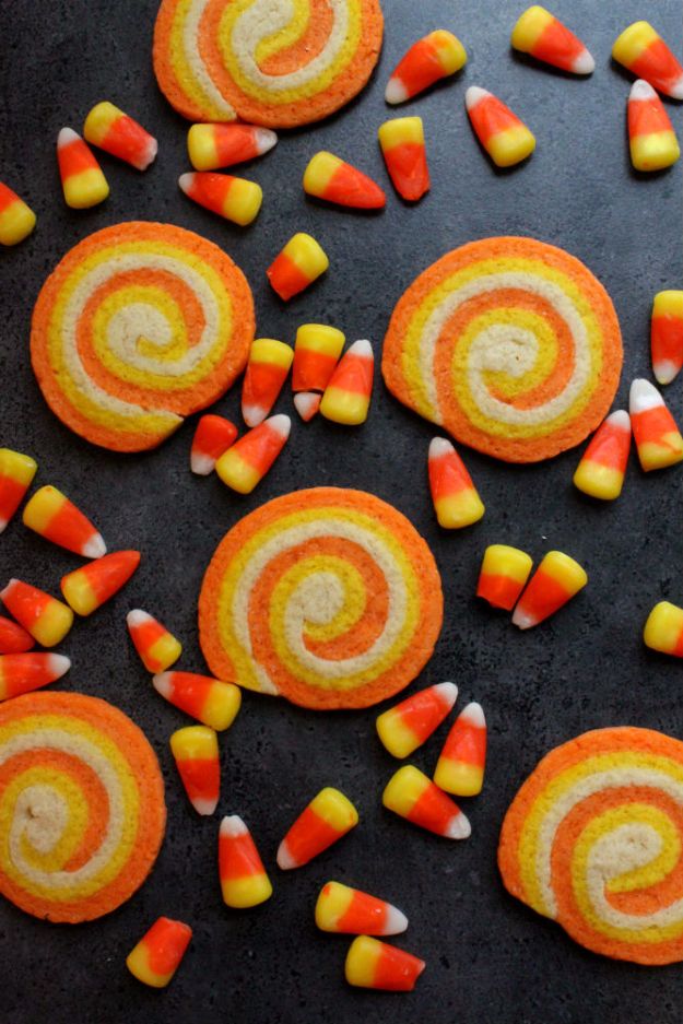 Cute Halloween Cookies - Candy Corn Swirl Cookies - Easy Recipes and Cookie Tutorials for Making Quick Halloween Treats - Spooky DIY Decorated Ghosts, Pumpkins, Bats, No Bake, Spiders and Spiderwebs, Tombstones and Healthy Options, Kids and Teens Cookies for School #halloween #halloweencookies