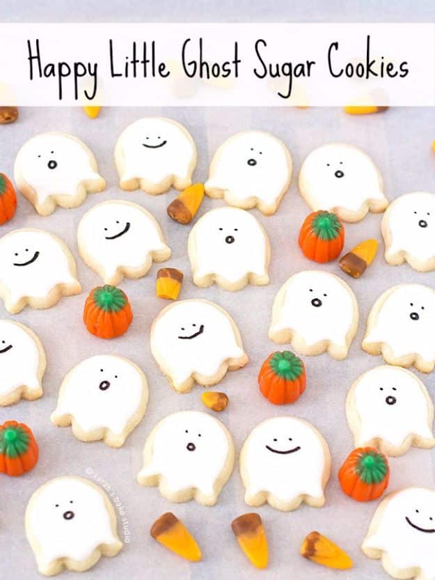 Cute Halloween Cookies - Happy Little Ghost Sugar Cookies - Easy Recipes and Cookie Tutorials for Making Quick Halloween Treats - Spooky DIY Decorated Ghosts, Pumpkins, Bats, No Bake, Spiders and Spiderwebs, Tombstones and Healthy Options, Kids and Teens Cookies for School #halloween #halloweencookies