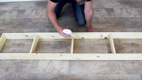 He Nails Boards Into A Long Narrow Rectangle Creating A $20 Farmhouse Item You’ll Love! | DIY Joy Projects and Crafts Ideas