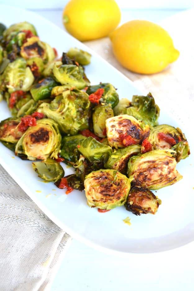 Best Thanksgiving Side Dishes - Lemon & Sun-Dried Tomato Brussels Sprouts - Easy Make Ahead and Crockpot Versions of the Best Thanksgiving Recipes #thanksgiving #recipes