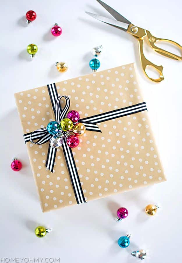 Creative Bows For Packages - Ribbon Bow With Ornament - Make DIY Bows for Christmas Presents and Holiday Gifts - Cute and Easy Ideas for Making Your Own Bows and Ribbons - Step by Step Tutorials and Instructions for Tying A Bow - Cheap and Crafty Gift Wrapping Ideas on A Budget #diy #gifts #giftwrapping #christmasgifts