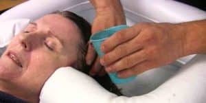 Wondering How To Wash Your Loved One’s Hair In The Hospital Bed? Watch!