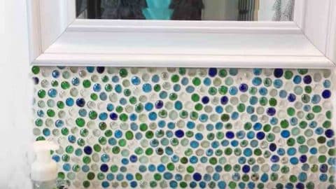 She Does This DIY Bathroom Backsplash With Dollar Store Gems For $6 And It’s Amazing! | DIY Joy Projects and Crafts Ideas