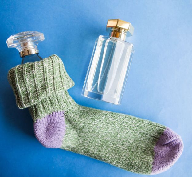 Packing Hacks for Travel - Slip Delicate Glass Items Into Socks - How to Pack and Fold Clothes, Save Space in Suitcase - Tips and Tricks for Shoes, Makeup, Toiletries, Carry On Luggage for Trips