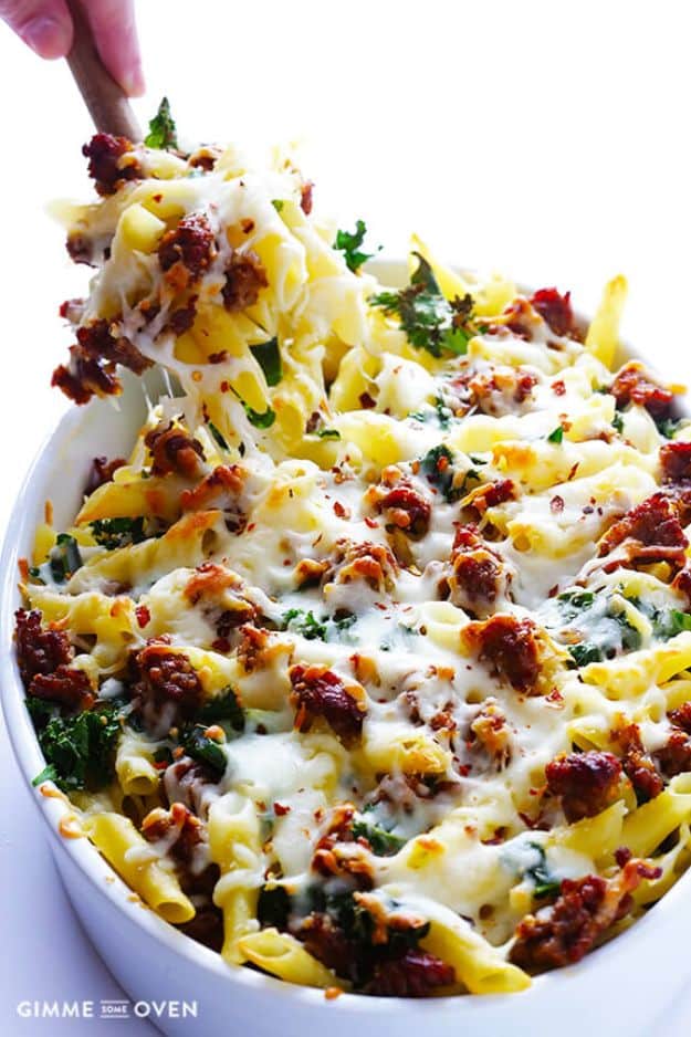 Best Kale Recipes - 5-Ingredient Italian Sausage And Kale Baked Ziti - How to Cook Kale at Home - Healthy Green Vegetable Cooking for Salads, Soup, Lunches, Stir Fry and Dinner - Kale Chips. Salad, Shredded, Cooked, Fresh and Sauteed Kale - Vegan, Vegetarian, Keto, Low Carb and Lowfat Recipe Ideas #kale #kalerecipes #vegetablerecipes #veggies #recipeideas #dinnerideas 