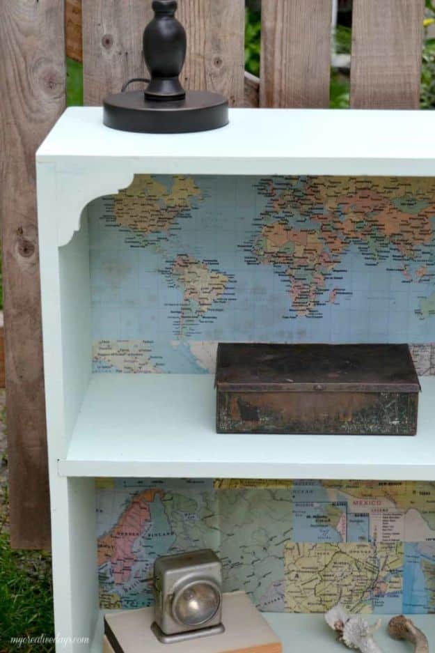 DIY Ideas With Maps - Bookshelf Makeover With Maps - Easy Crafts, Home Decor, Art and Gifts Your Can Make With A Map - Pinboard, Canvas, Painting, Paper Flowers, Signs Projects