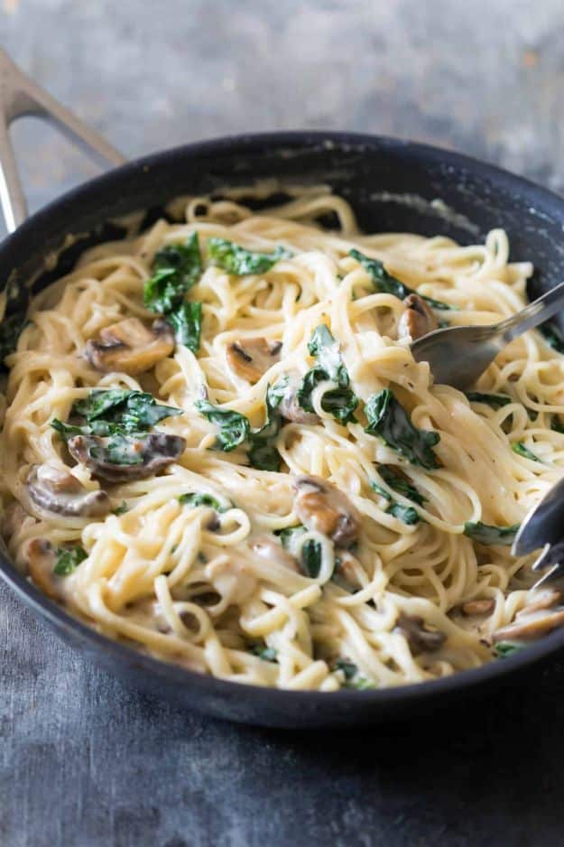 Best Kale Recipes - Creamy Lemon Mushroom Kale Linguine Pasta - How to Cook Kale at Home - Healthy Green Vegetable Cooking for Salads, Soup, Lunches, Stir Fry and Dinner - Kale Chips. Salad, Shredded, Cooked, Fresh and Sauteed Kale - Vegan, Vegetarian, Keto, Low Carb and Lowfat Recipe Ideas #kale #kalerecipes #vegetablerecipes #veggies #recipeideas #dinnerideas 