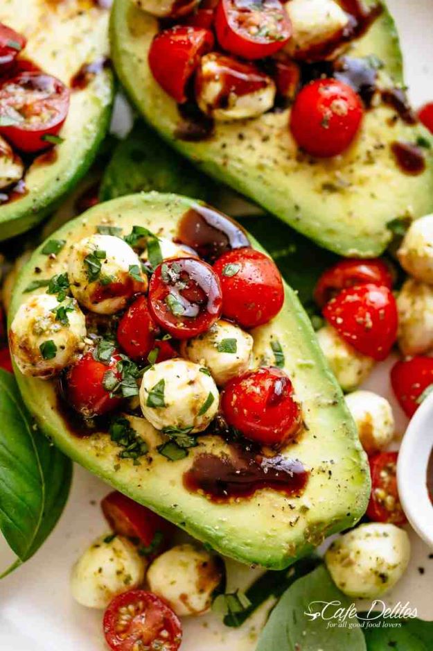 Avocado Recipes - Caprese Stuffed Avocado - Quick Avocado Toast, Eggs, Keto Guacamole, Dips, Salads, Healthy Lunches, Breakfast, Dessert and Dinners - Party Foods, Soups, Low Carb Salad Dressings and Smoothie #avocado #recipes