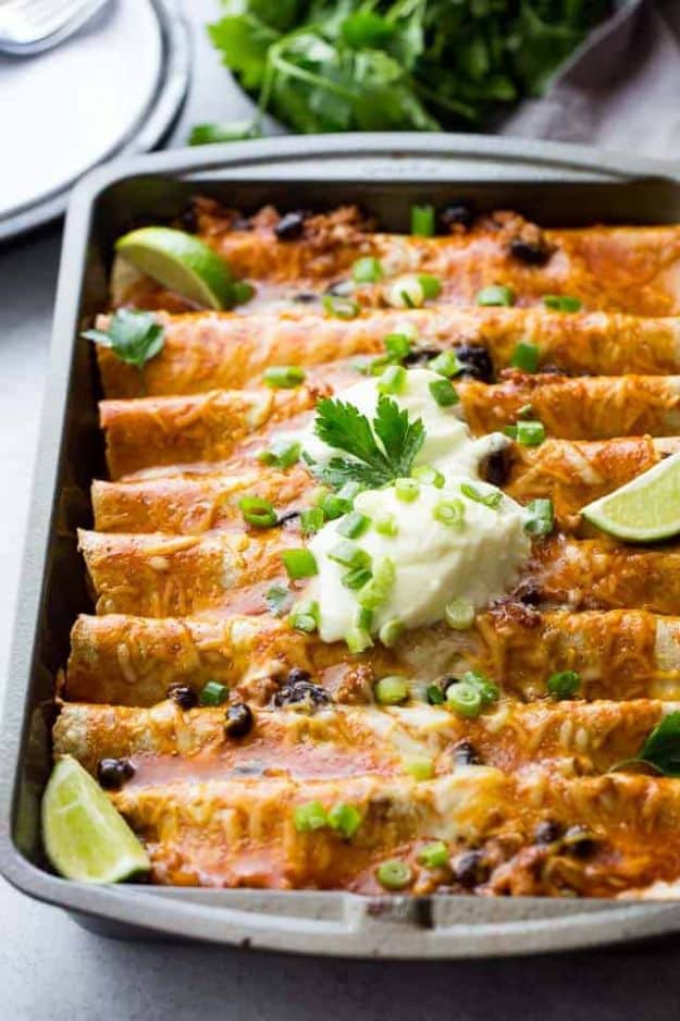 Ground Turkey Recipes - Ground Turkey Black Bean Enchiladas - Healthy and Easy Turkey Recipe Ideas for Dinner, Lunch, Snack - Quick Crockpot and Instant Pot, Casserole, Meatballs, Pasta and Burgers - Keto Friendly and Low Carb, Paleo, Gluten Free #turkeyrecipes